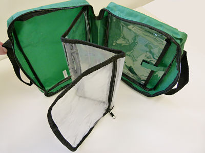 Green First Aid Bag With Handles 3 clear fold out compartments. - Image 2